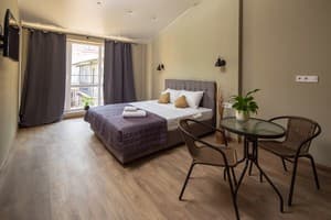 Квартира Poet Apartments. Апартаменты двухместный с балконом 4
